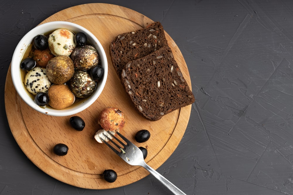 Sliced bread on a cutting board representing carbohydrate macronutrients
